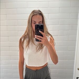 ALO Yoga White Crop Top with Breathable Fabric and Sleek Design